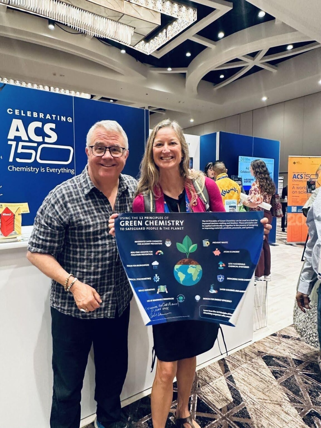 Cindy Anderson with John Warner at the GC&E Conference.